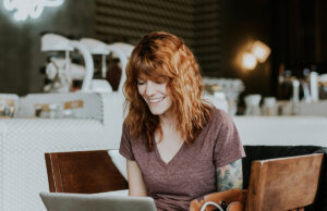 Graduate Assistantships: How to Pay for Your Master’s or Ph.D. Degree Woman studying and working on her laptop